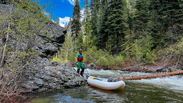 Portaging a log on the North Fork John Day